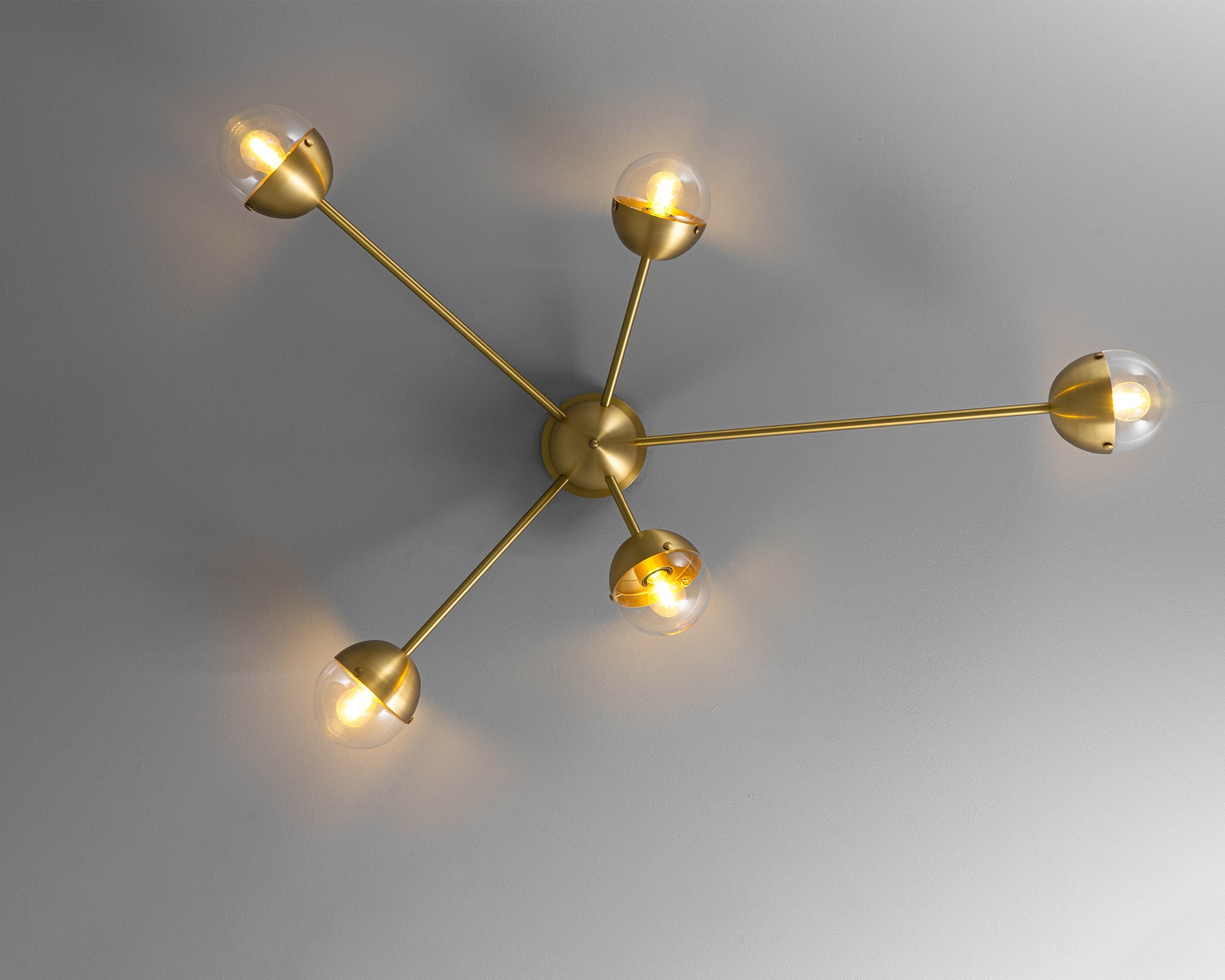 Schwung Molecule Spark Burnished Brass Transparent Ceiling/Wall Light